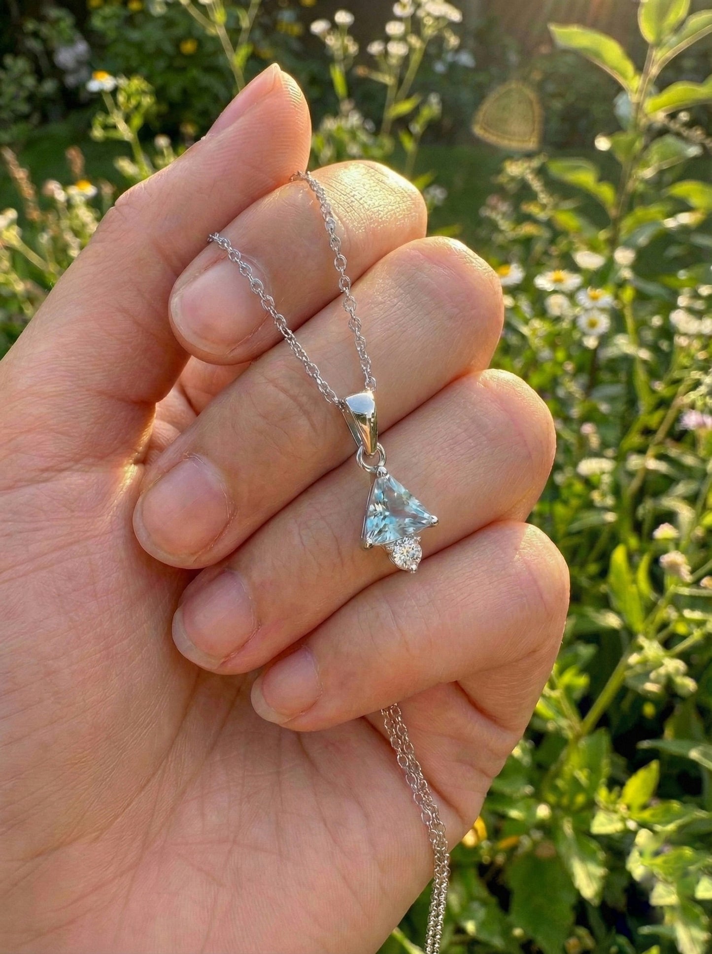 "The Glacial Trillion Pendant"